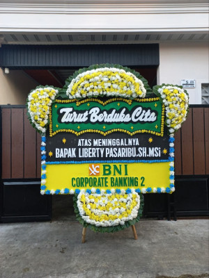 Papan Bunga Duka di Beber
