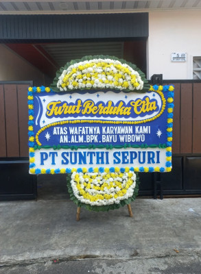 Papan Bunga Duka di Beber