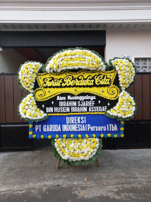 Papan Bunga Duka di Beber