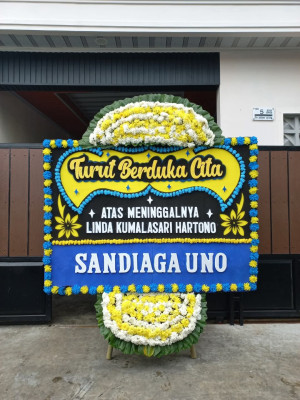 Papan Bunga Duka di Beber
