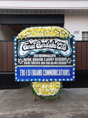 Papan Bunga Duka di Beber